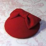 Red cocktail hat.