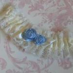 Ivory bridal garter with bl..