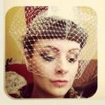 Champagne birdcage veil.