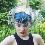Ivory silk bow birdcage vei..