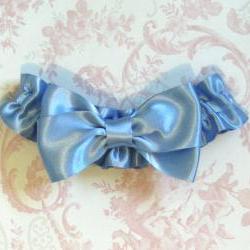 Big blue bow bridal garter.
